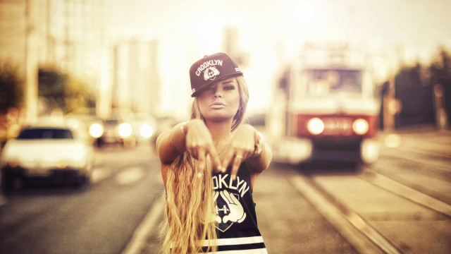 Woman long hair pointing tram free wallpaper - medium preview image