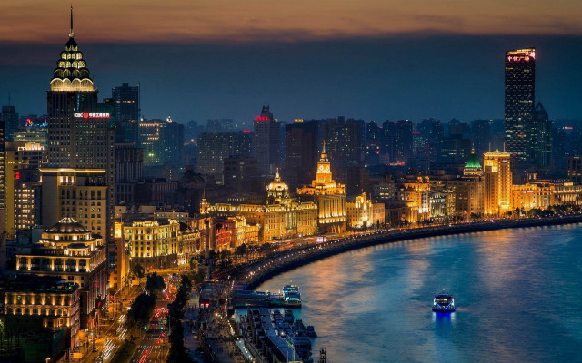 City skyline night boat water free wallpaper - medium preview image