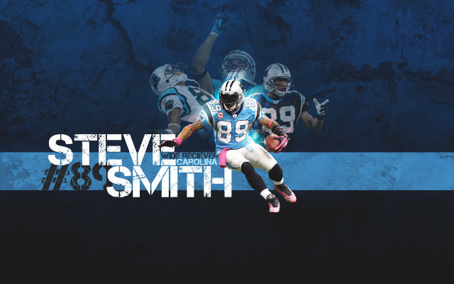Football player jumping arms up free wallpaper - medium preview image