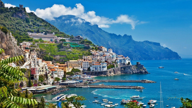 Coastal cityscape mountains boats bridge free wallpaper - medium preview image