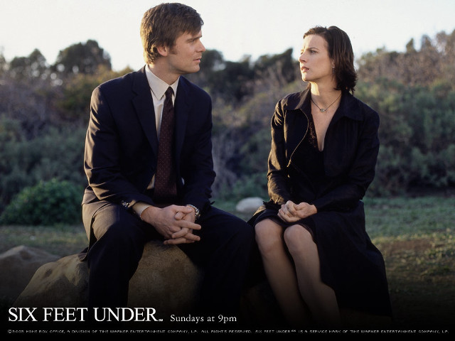 Man woman sitting rock park free wallpaper - medium preview image