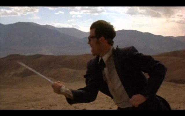 Man suit tie sword desert free wallpaper - medium preview image