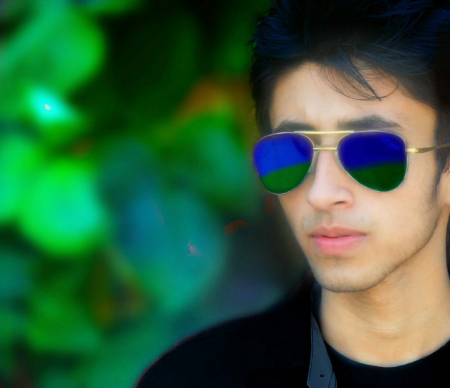 Man sunglasses green blue background free wallpaper - medium preview image