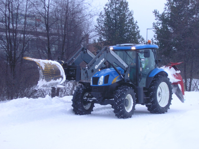 Tractor plowing snow field snow free wallpaper - medium preview image
