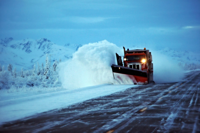 Large truck plowing snow covered free wallpaper - medium preview image