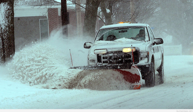 Snow plow driving snowy street free wallpaper - medium preview image