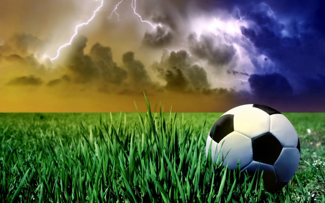 Soccer ball grass storm cloud #2 free wallpaper - medium preview image
