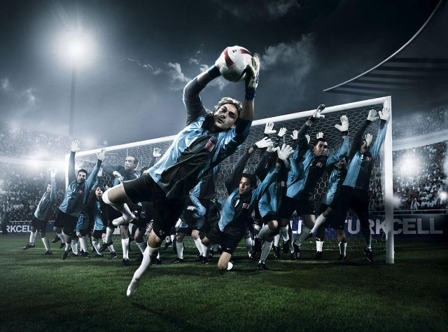 Soccer player jumping catch ball free wallpaper - medium preview image
