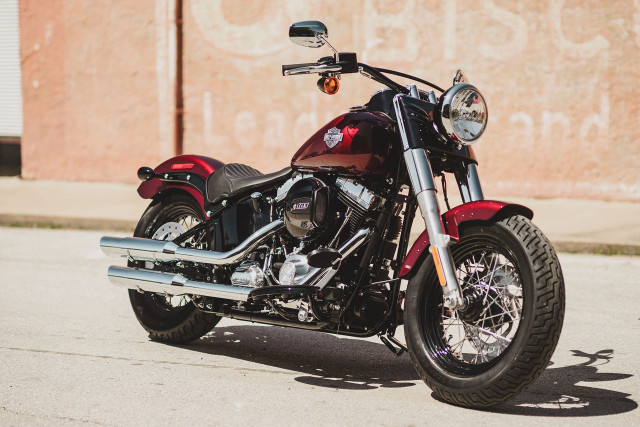 Red motorcycle parked road building free wallpaper - medium preview image