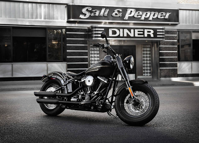 Black motorcycle parked restaurant salt #2 free wallpaper - medium preview image