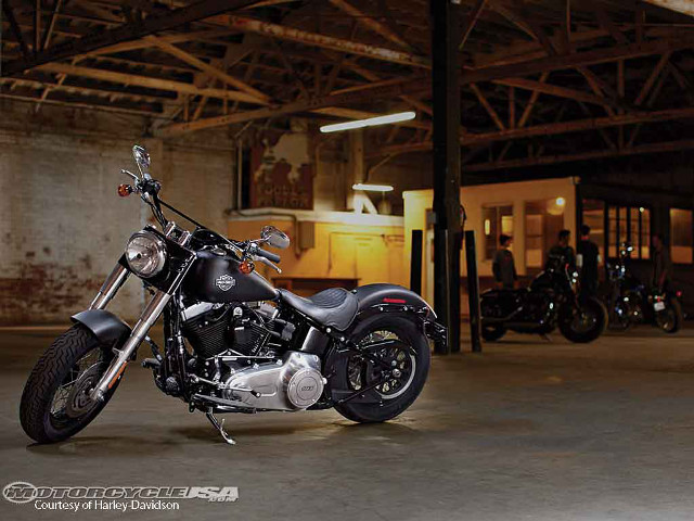 Motorcycle parked garage background building free wallpaper - medium preview image