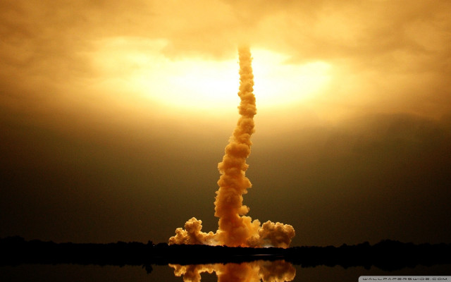Tall tower smoke sun background #2 free wallpaper - medium preview image