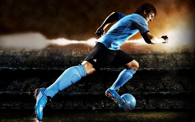 Soccer player kicking stadium night free wallpaper - medium preview image