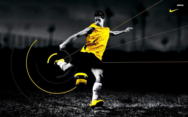 Astronaut boy kicking soccer yellow free wallpaper - medium preview image