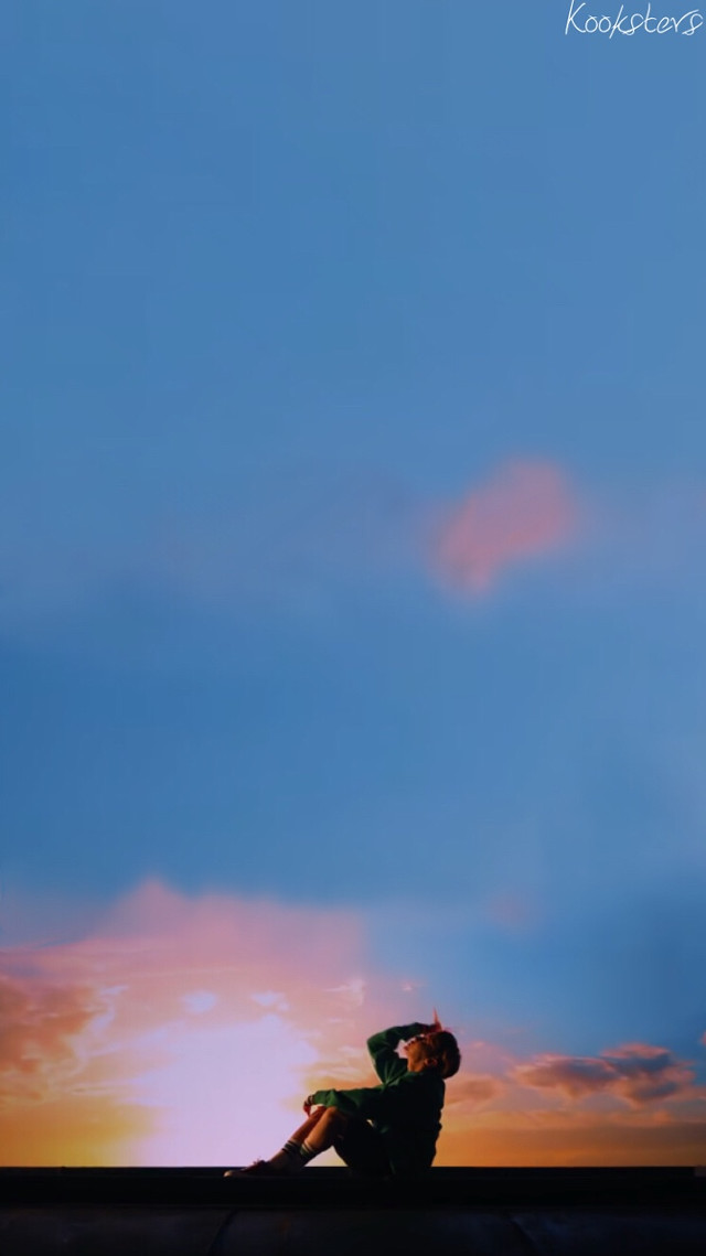 Person sitting ledged sky sunset free wallpaper - medium preview image