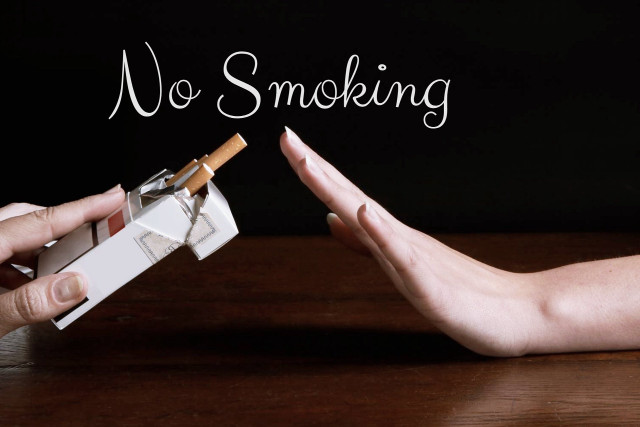 Person holding cigarette no smoking free wallpaper - medium preview image