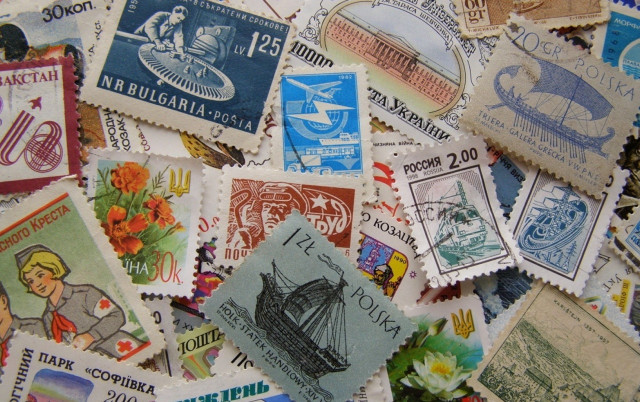 Stamps colorful pile table ship free wallpaper - medium preview image