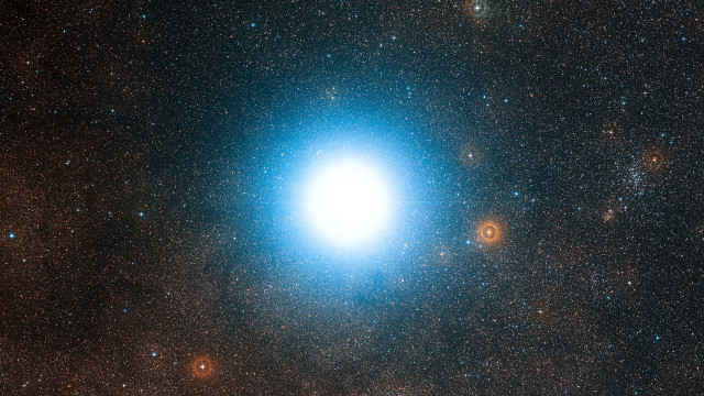 Bright blue object dark sky free wallpaper for desktop - medium preview image