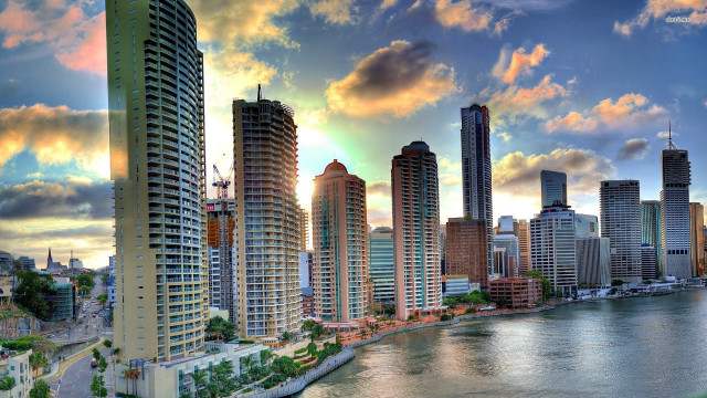 City skyline river sunset clouds free wallpaper - medium preview image