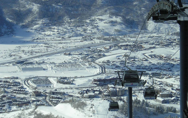Ski lift snowy mountain town free wallpaper - medium preview image