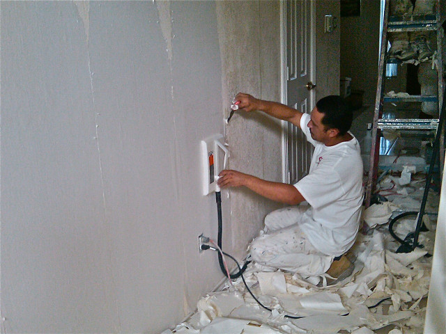 Man painting wall paint roller free wallpaper - medium preview image
