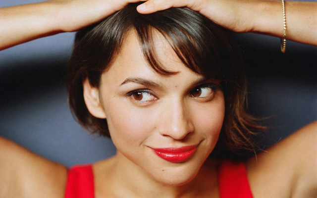 Woman red top necklace hands free wallpaper - medium preview image