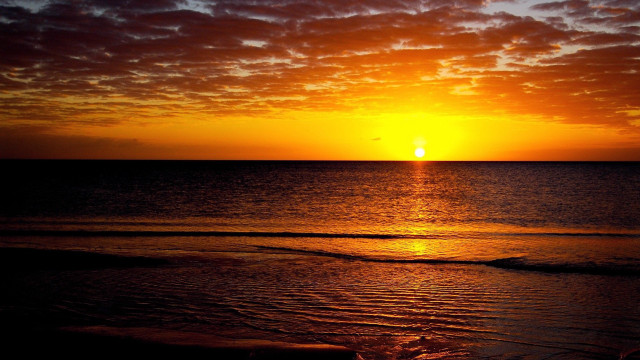 Sunset ocean beach walkers distant free wallpaper - medium preview image