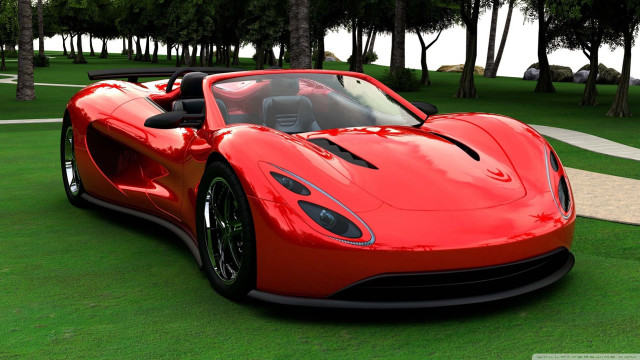 Red sports car green field free wallpaper - medium preview image