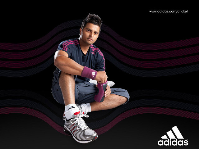 Man sitting ground tennis racket free wallpaper - medium preview image
