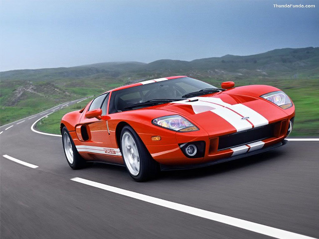 Red sports car driving road #13 free wallpaper - medium preview image