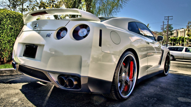 White sports car parking lot #36 free wallpaper - medium preview image