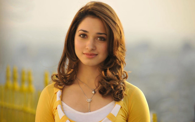 Woman yellow shirt necklace yellow free wallpaper - medium preview image