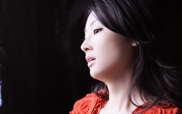 Woman red dress looking distance free wallpaper - medium preview image