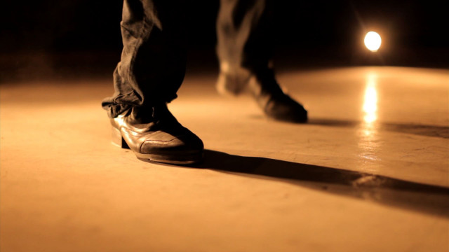 Person standing floor shoelaced shoe free wallpaper - medium preview image