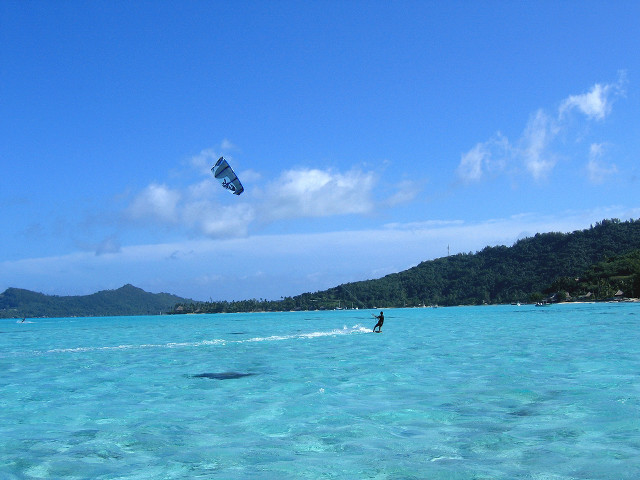 Parasailing ocean blue sky clouds free wallpaper - medium preview image