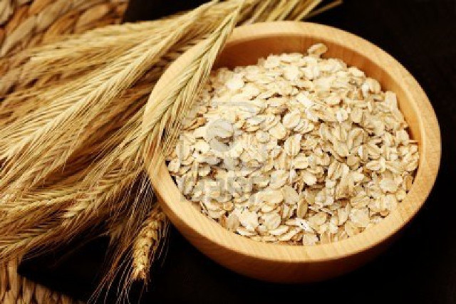 Wooden bowl filled oats wheat free wallpaper - medium preview image
