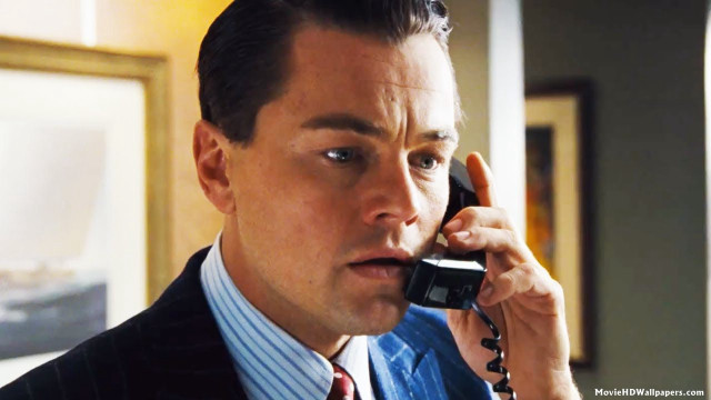 Man suit phone serious expression free wallpaper - medium preview image