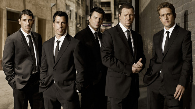 Men suits group standing building free wallpaper - medium preview image