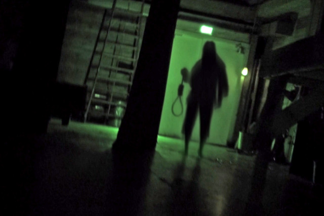 Person dark room hose green free wallpaper - medium preview image