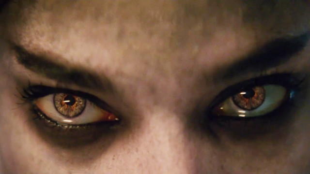 Brown eyes creepy close up free wallpaper - medium preview image