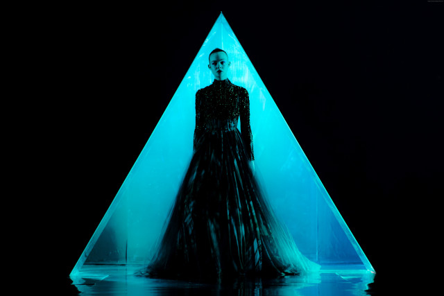 Woman black dress blue triangle free wallpaper - medium preview image