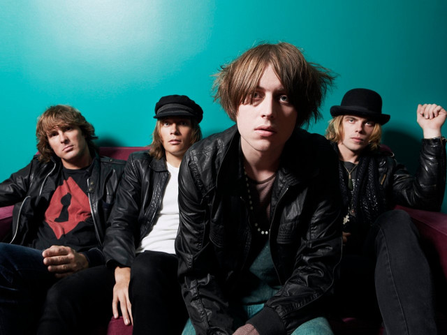 Group men couch blue wall free wallpaper - medium preview image