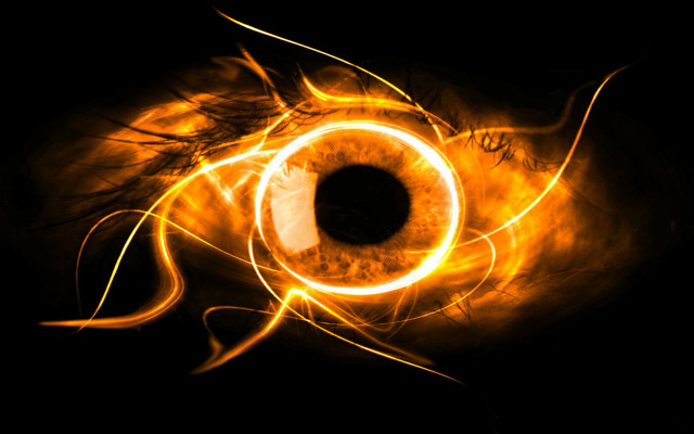 Bright orange eyeball black background free wallpaper - medium preview image