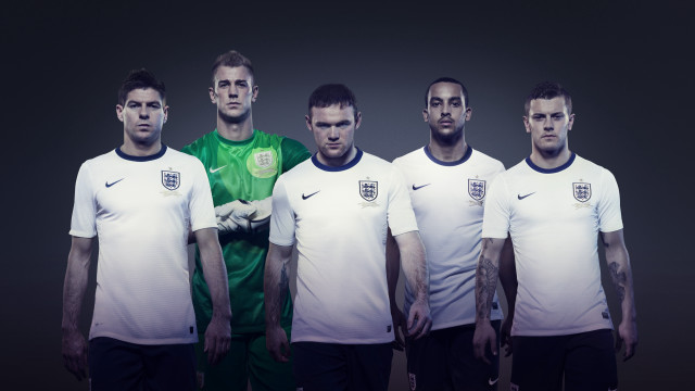 Soccer team men uniforms holding free wallpaper - medium preview image
