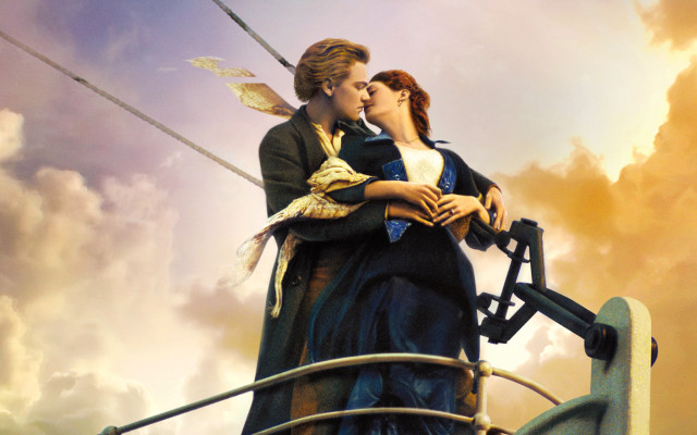 Two people standing on boat free wallpaper - medium preview image