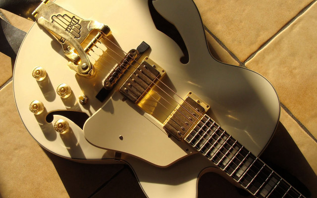 White guitar gold hardware tile free wallpaper - medium preview image
