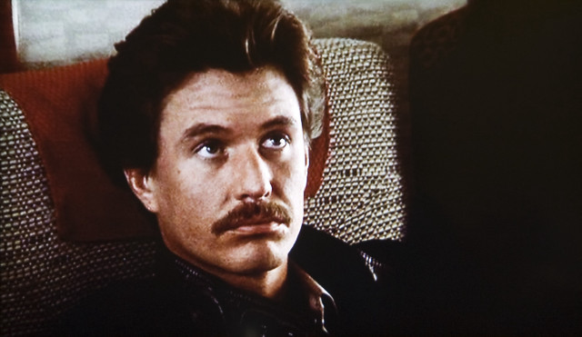 Man mustache couch television screen free wallpaper - medium preview image