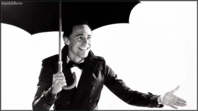 Man tuxedo umbrella smiling camera free wallpaper - medium preview image