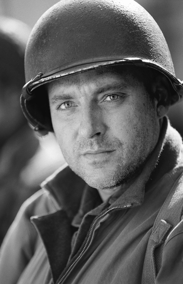 Man helmet jacket serious look free wallpaper - medium preview image