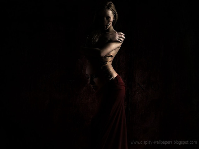 Woman long dress posing dark free wallpaper - medium preview image